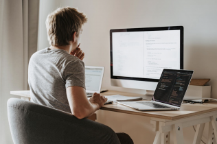 Man Staring at a Computer Screen